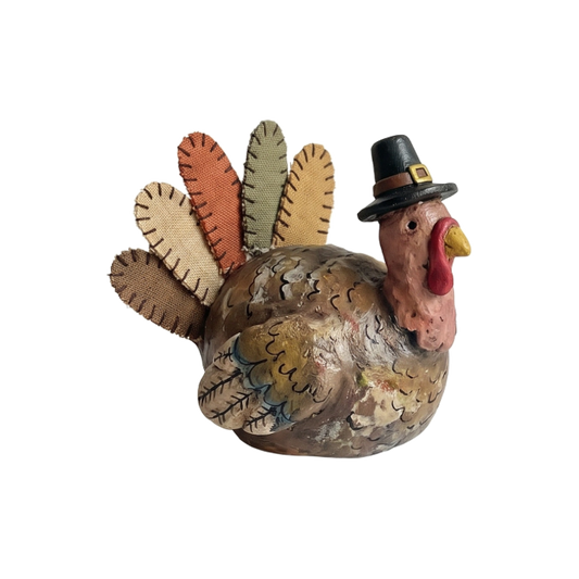Folk art turkey with stitched tail feathers and pilgrim hat