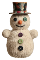 Whimsical knitted snowman doll with top hat and button details